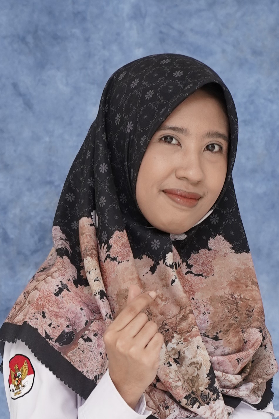 Reny Novia Sari, S.I.Pust.